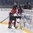 POPRAD, SLOVAKIA - APRIL 13: Canada's Joshua Brook #2 bodychecks Latvia's Valters Egle #9 during preliminary round action at the 2017 IIHF Ice Hockey U18 World Championship. (Photo by Andrea Cardin/HHOF-IIHF Images)